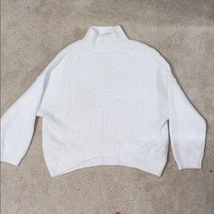 White mock neck sweater